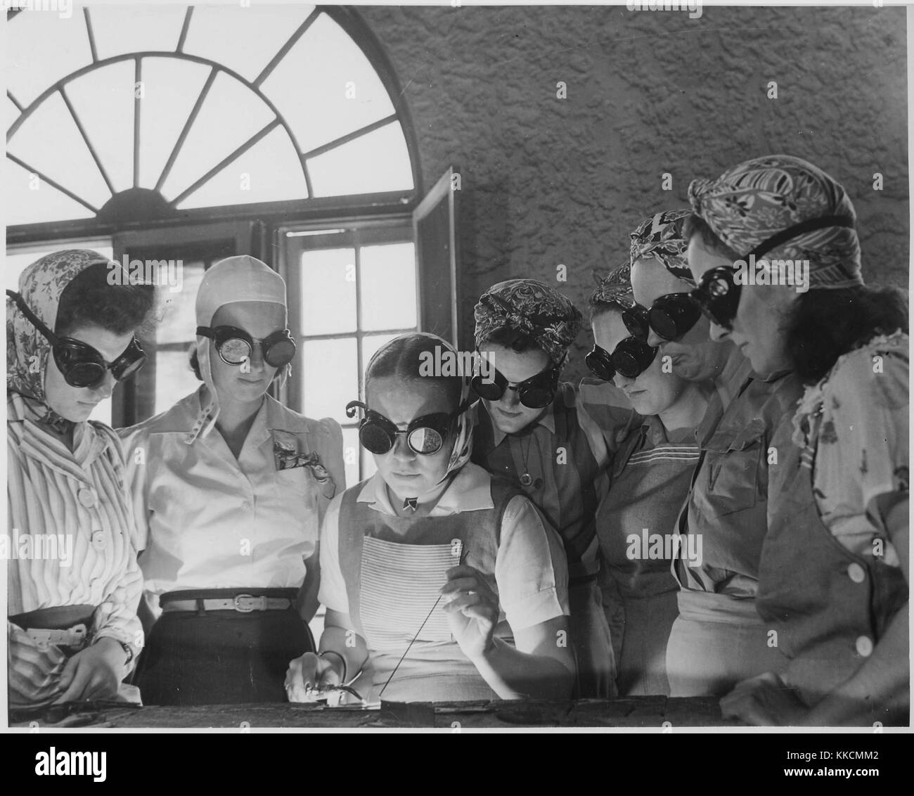 Secretaries, housewives, waitresses, and other women from central Florida in vocational schools to learn war work during World War 2. Image courtesy National Archives. 1942. Stock Photo
