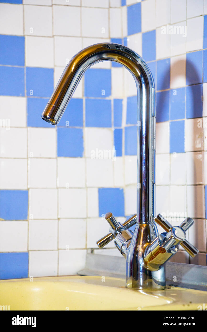 New faucet in the sink Stock Photo - Alamy