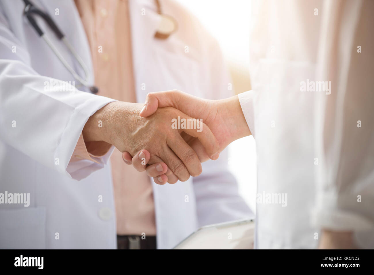 asian medical team handshaking Stock Photo Alamy