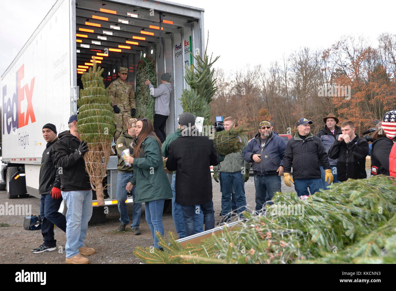 New York National Soldiers and Airmen helps load donated Christmas