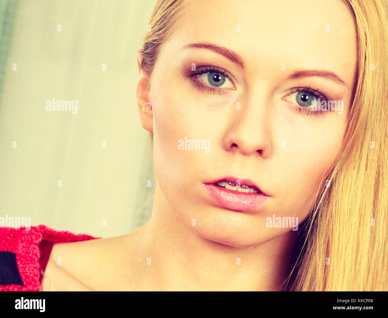Feminity, expressions concept. Portrait of blonde woman with serious ...