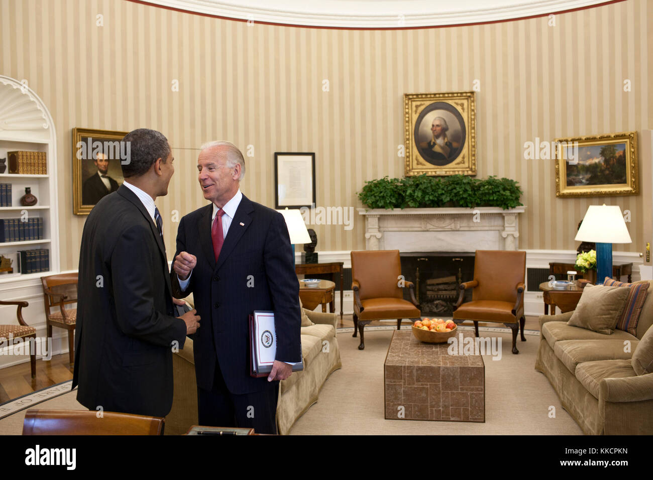 President Barack Obama talks with Vice President Joe Biden in the Oval ...