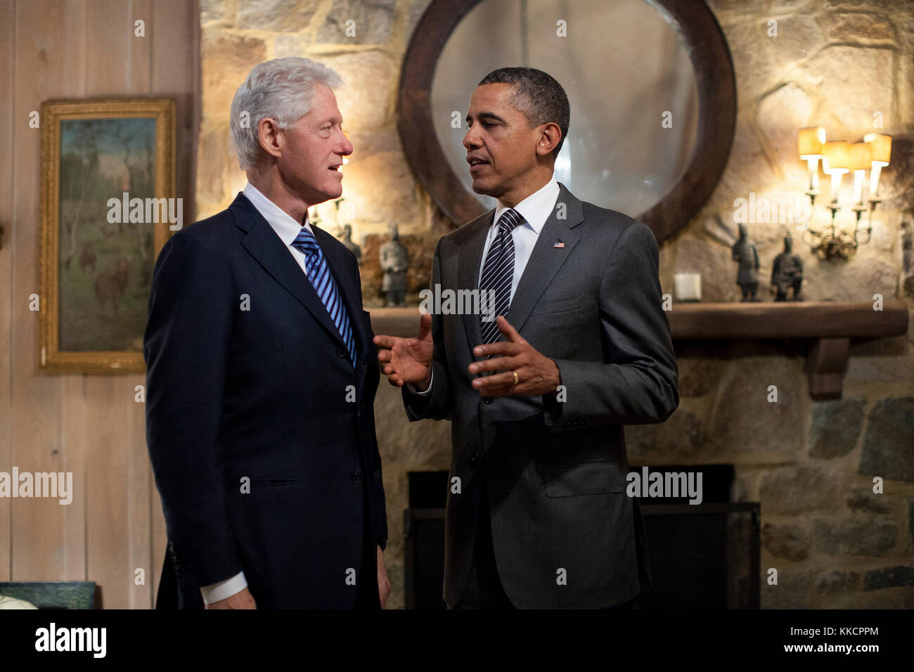 President Barack Obama talks with former President Bill Clinton before an event in McLean, Va., Sunday, April 29, 2012. (Official White House Photo by Pete Souza)  This official White House photograph is being made available only for publication by news organizations and/or for personal use printing by the subject(s) of the photograph. The photograph may not be manipulated in any way and may not be used in commercial or political materials, advertisements, emails, products, promotions that in any way suggests approval or endorsement of the President, the First Family, or the White House. Stock Photo