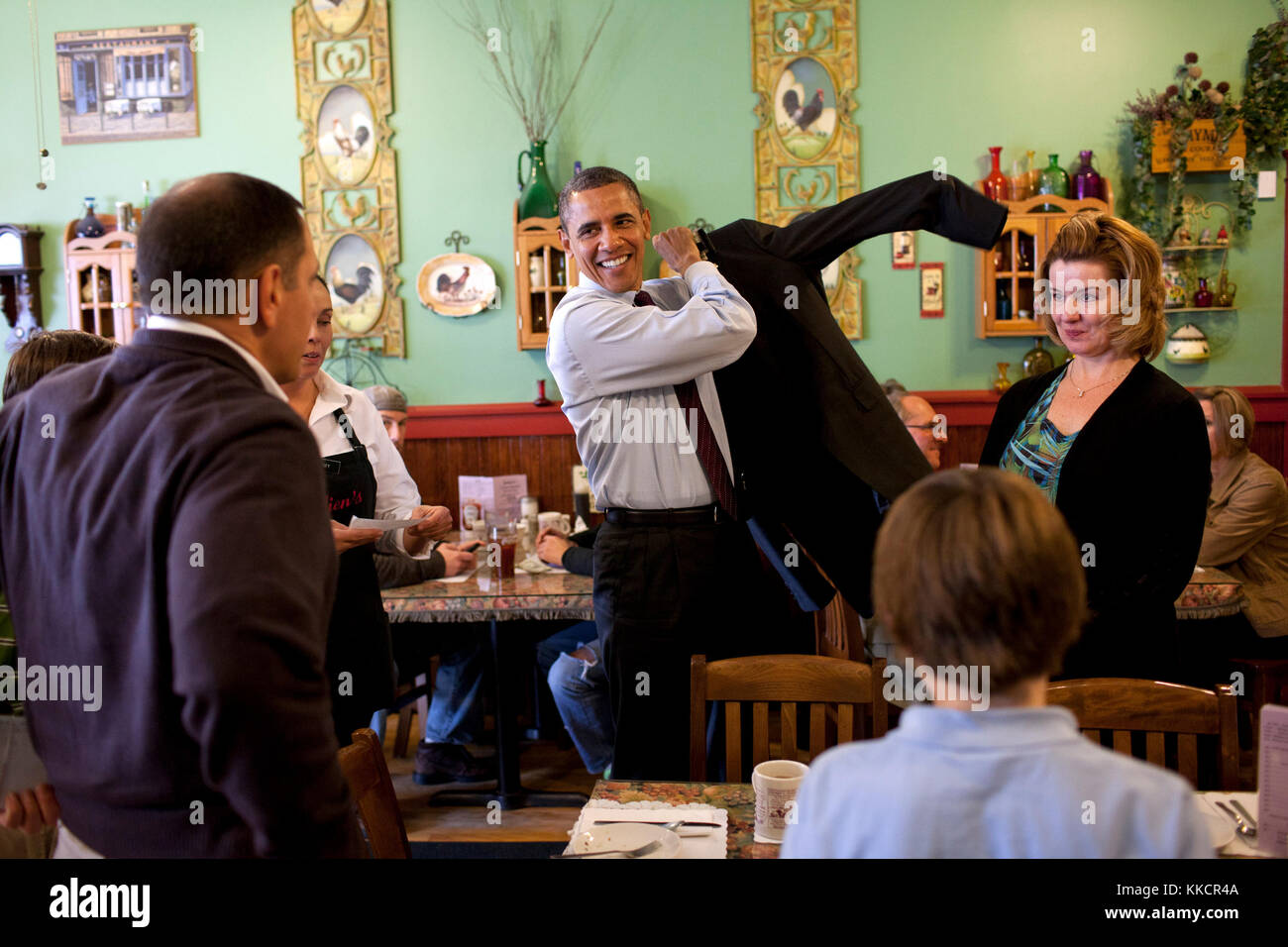 President Barack Obama visits with the Corkery family during a stop at