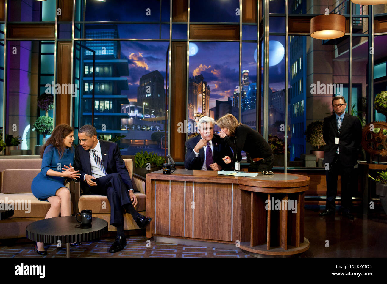 President Barack Obama talks with co-producer Michele Tasoff during a break in taping “The Tonight Show with Jay Leno” at NBC Studios in Burbank, Calif., Oct. 25, 2011. Stock Photo