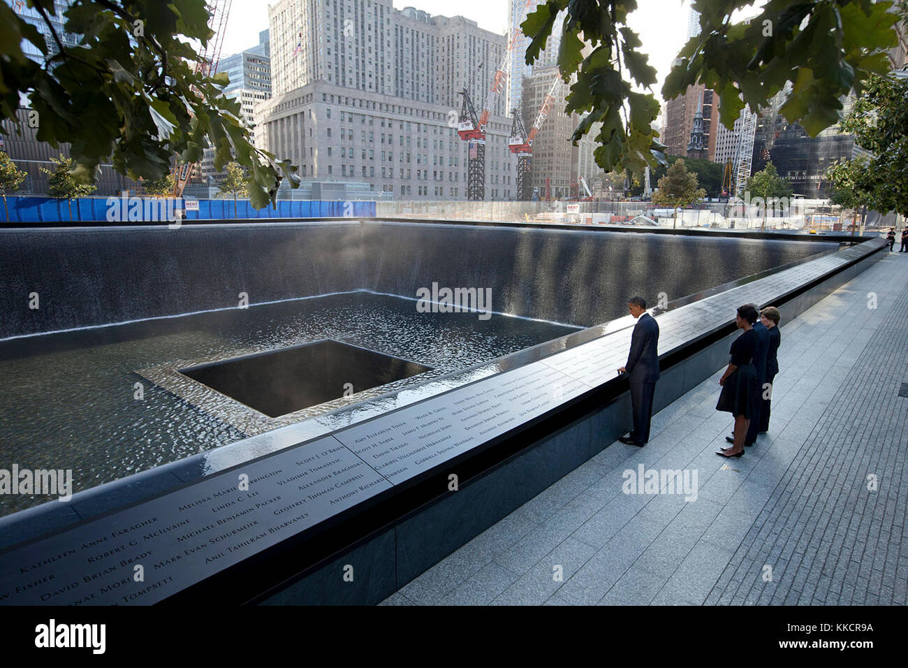 Sept. 11, 2011  President and First Lady, along with former President George W. Bush and former First Lady Laura Bush, paused at the North Memorial Pool of the National September 11 Memorial in New York City. The North Memorial pool sits in the footprint of the north tower, formerly 1 World Trade Center. Stock Photo