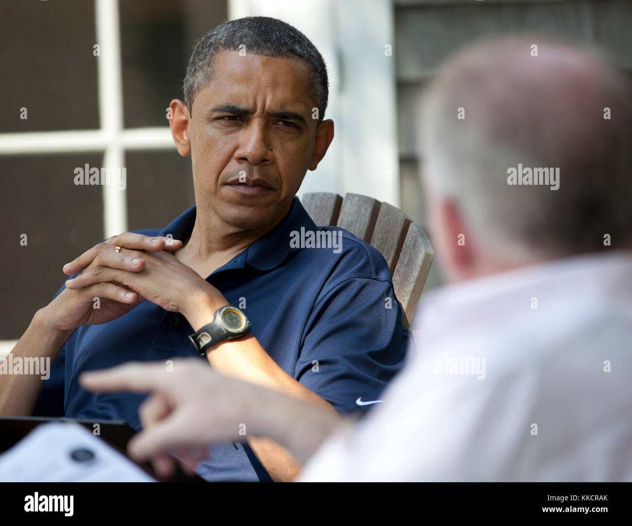 President Barack Obama receives a national security briefing from John ...