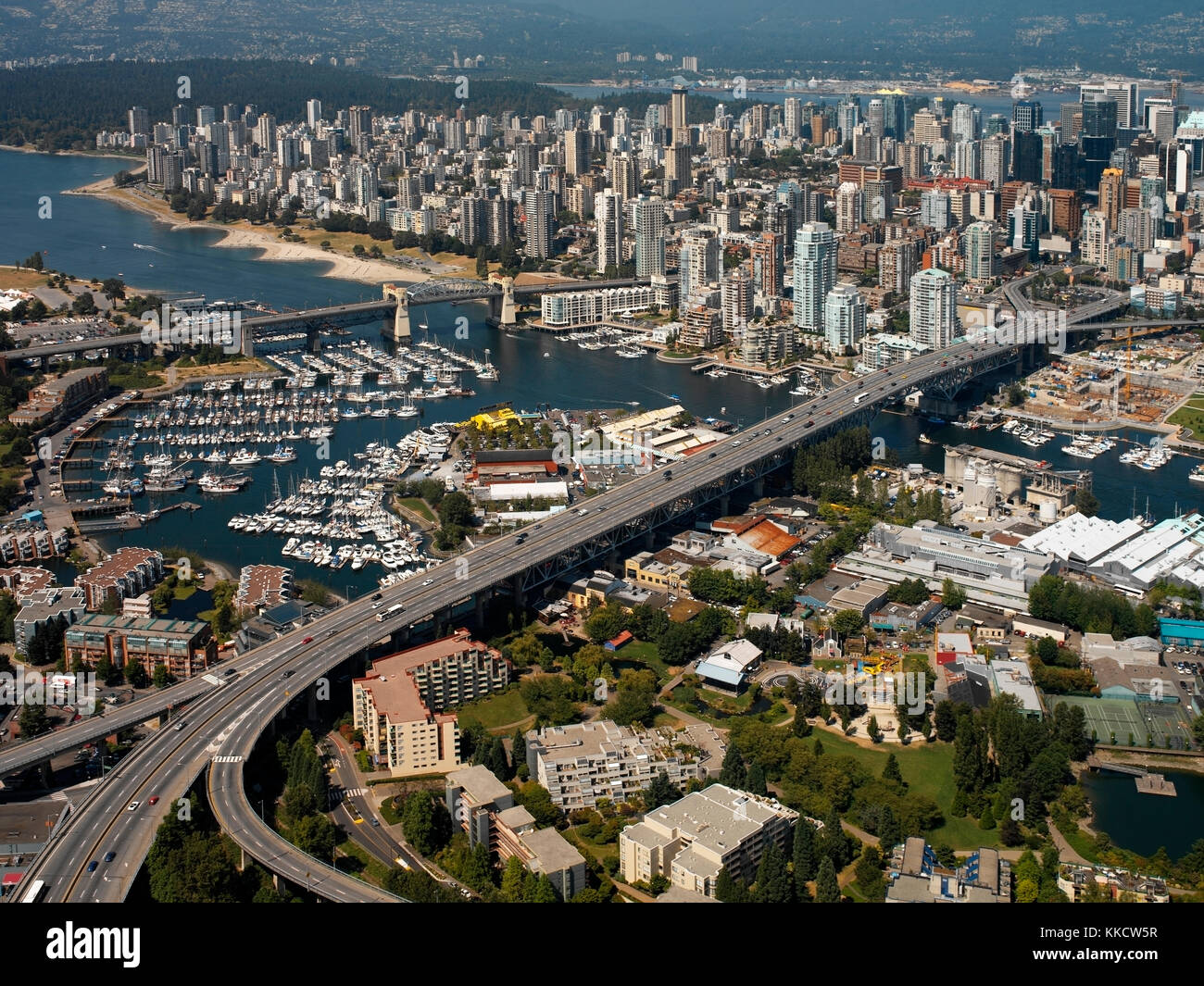 Aerial view of Granville Harbor and bridge in False Creek. Burrard ...