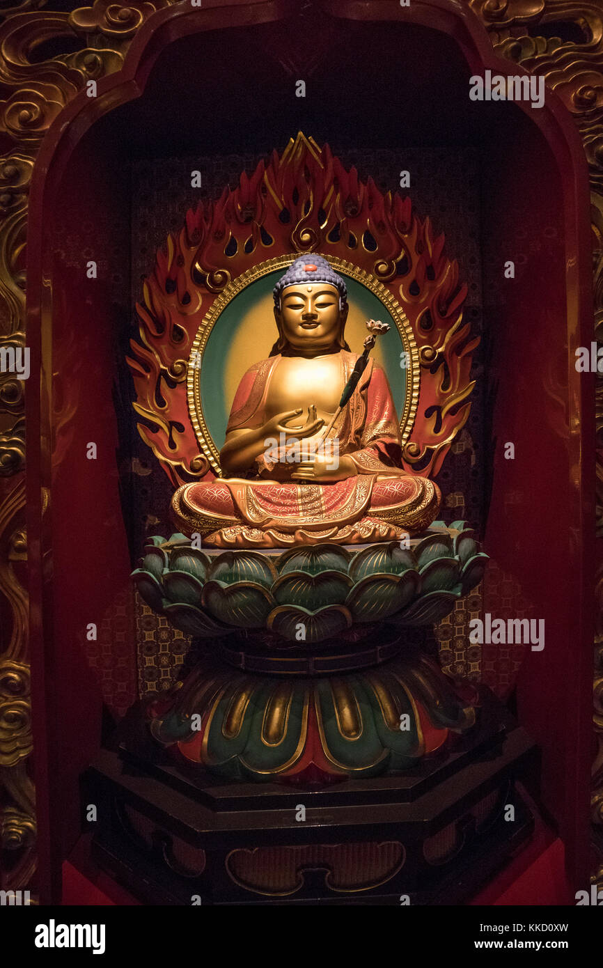 Buddha statues at the Buddha Tooth Relic Temple and Museum in Chinatown, Singapore Stock Photo