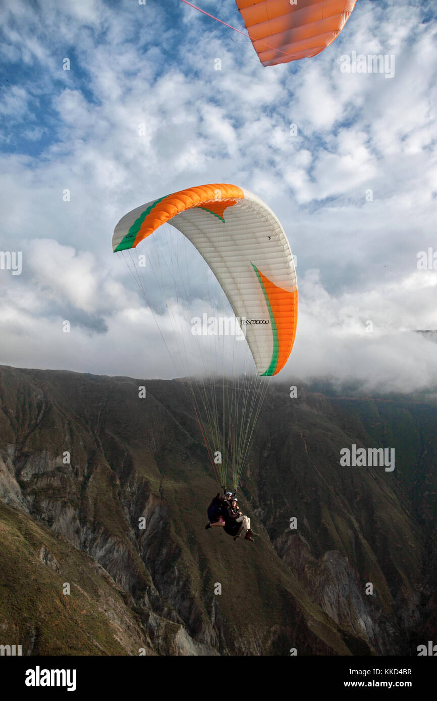 VENEZUELA, 22 NOVEMBER 2010: tandem paragliding flight in Venezuelan Andes Stock Photo