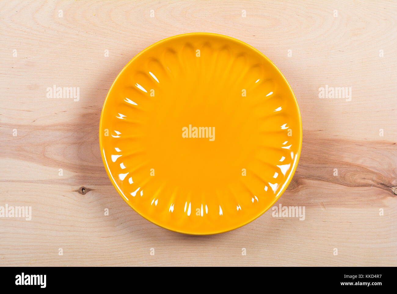 Empty porcelain plate on wooden background Stock Photo