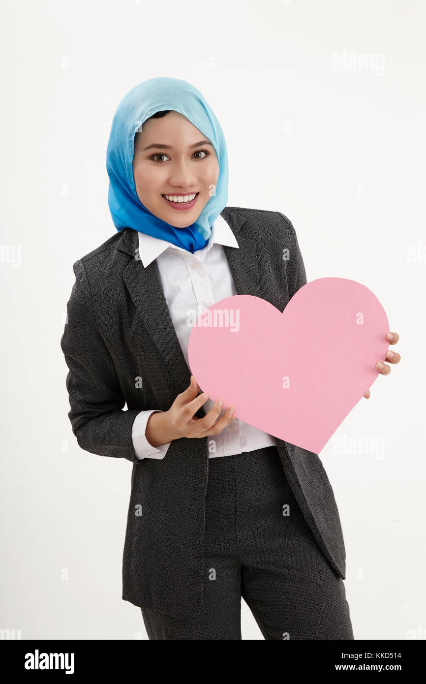 Malay Business Woman With Tudung Holding A Heart Shaped Placard Stock Photo Alamy