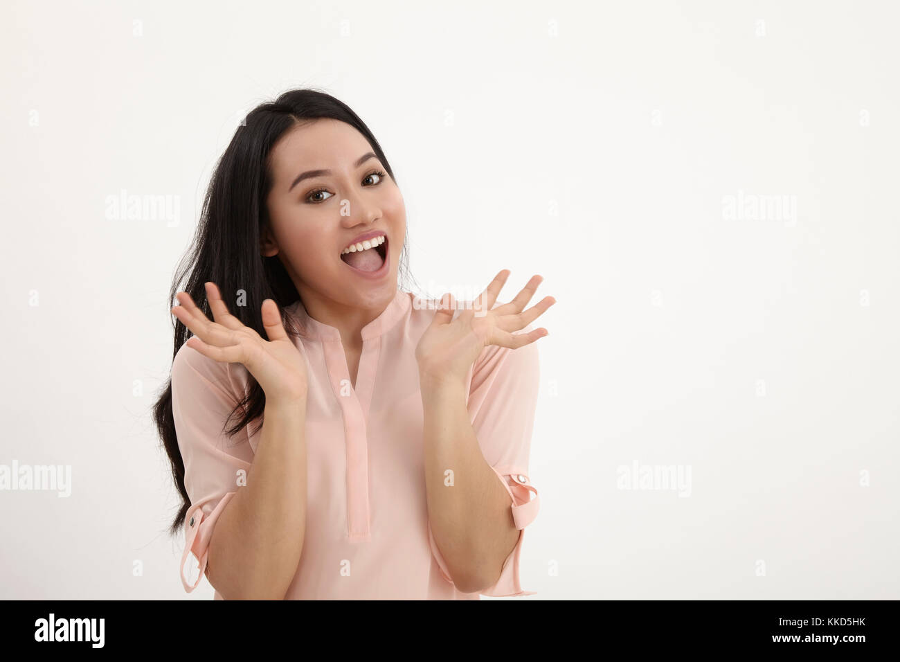 happy woman with hand on chin Stock Photo - Alamy