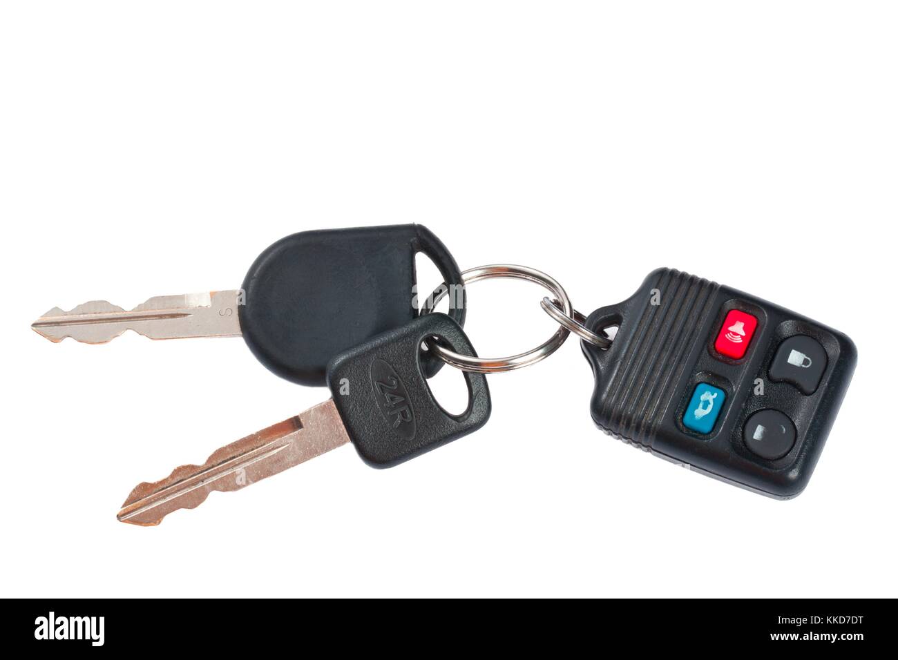 close up shot of plastic car keys and remote control on white background Stock Photo