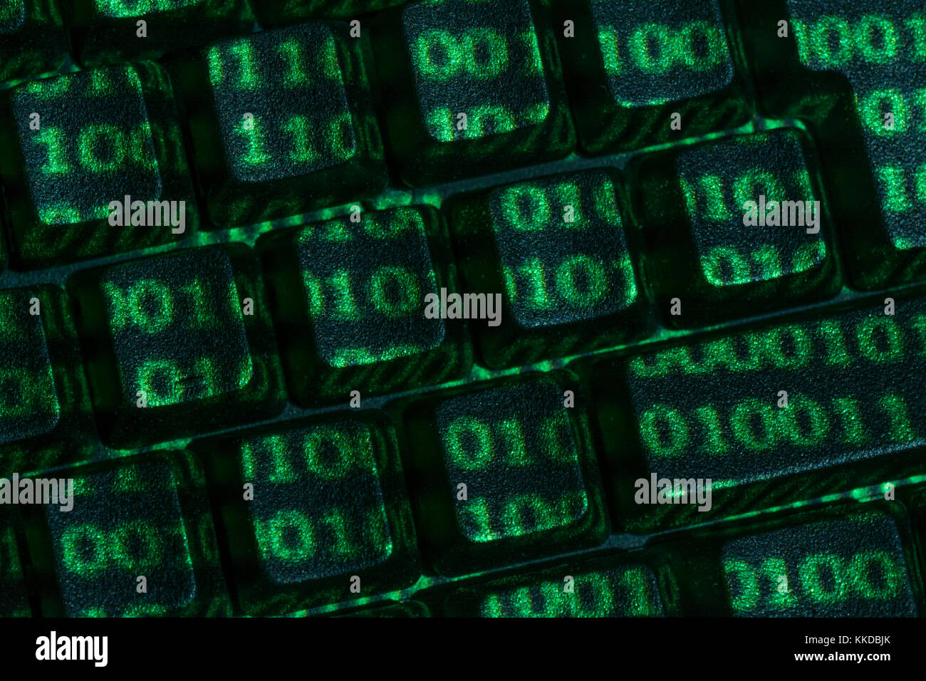 Black Qwerty keyboard + green Binary 0's & 1's surface projected. Cybercrime, darkweb, data encryption, world password day, cyber threat, hacking. Stock Photo