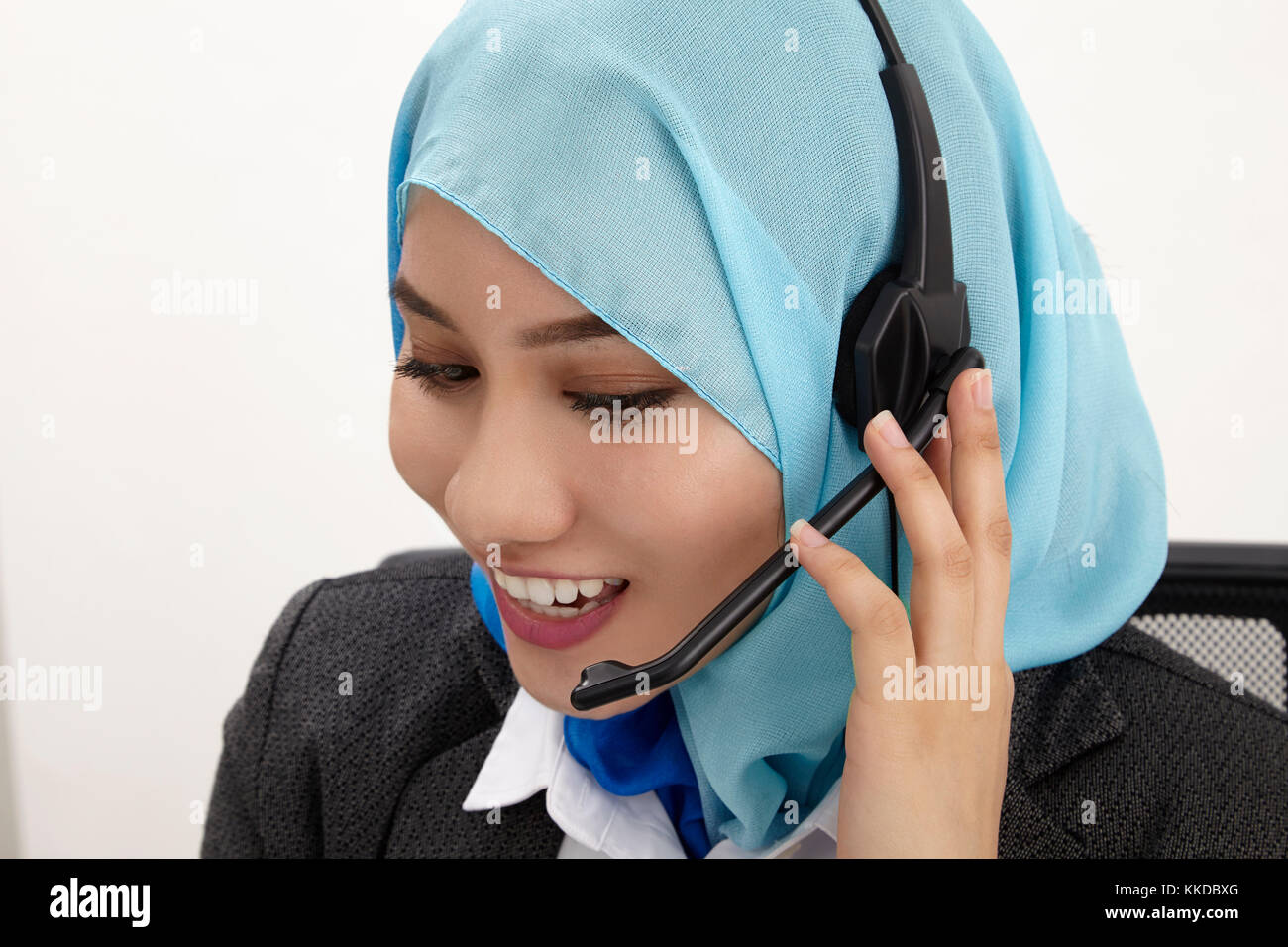 malay receptionist with tudung on the white background Stock Photo Alamy