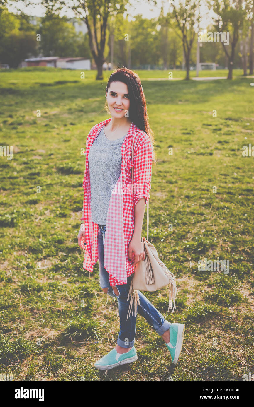 attractive hipster woman on the meadow Stock Photo - Alamy