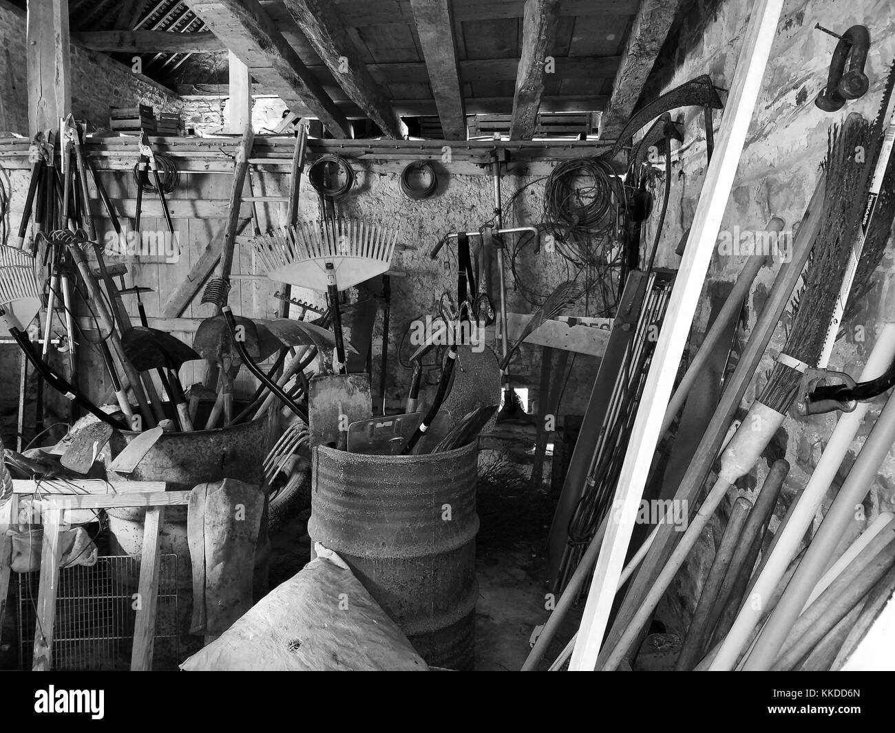 Farm workshop in Normandy with lots of tools Stock Photo