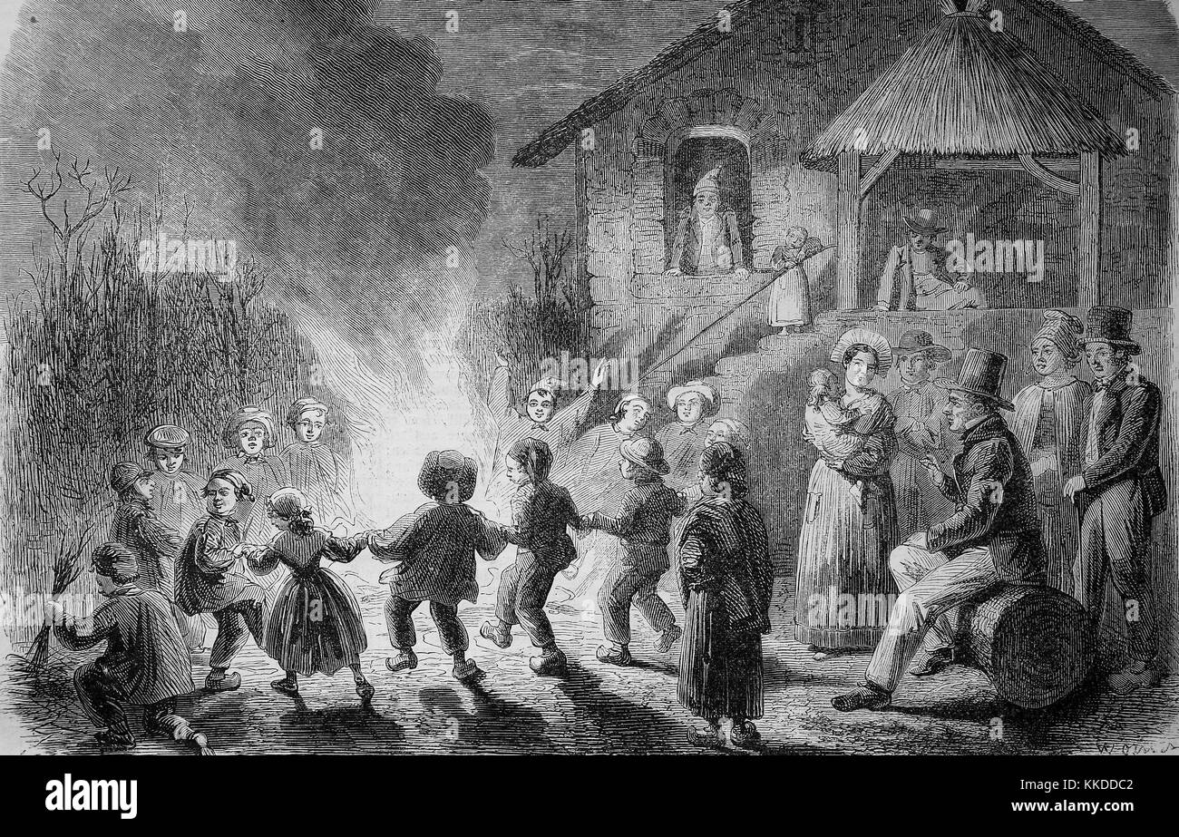 Children dance around a campfire, children s party in Provence, France, pictures of the time of 1855, Digital improved reproduction of an original woodcut Stock Photo