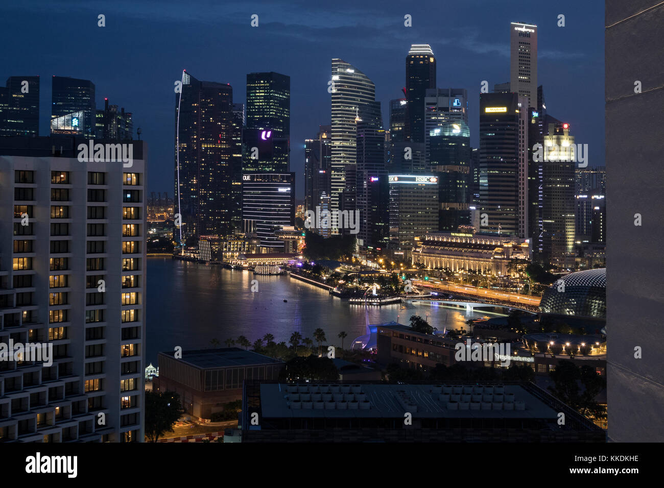 Dusk shot of  the Marina Bay area in Singapore, taken from the Pan Pacific Hotel showing the Singapore skyline at night Stock Photo