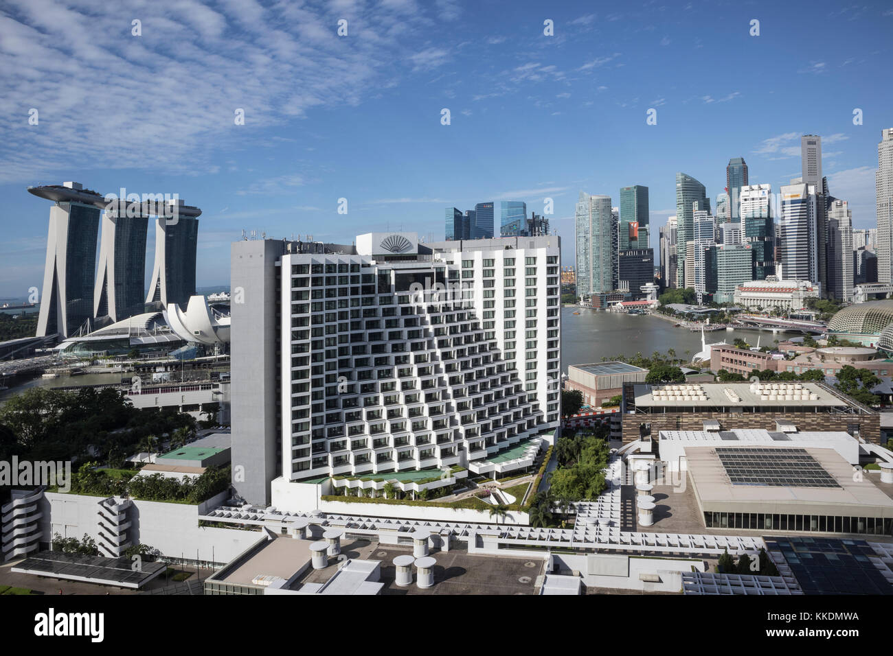 Daytime shot of  the Marina Bay area in Singapore, taken from the Pan Pacific Hotel with the Mandarin Oriental Hotel in the foreground Stock Photo