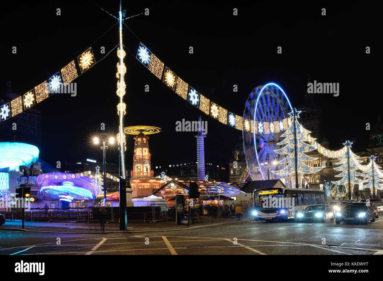 Glasgow, George Square Christmas lights and fairground attractions Stock Photo
