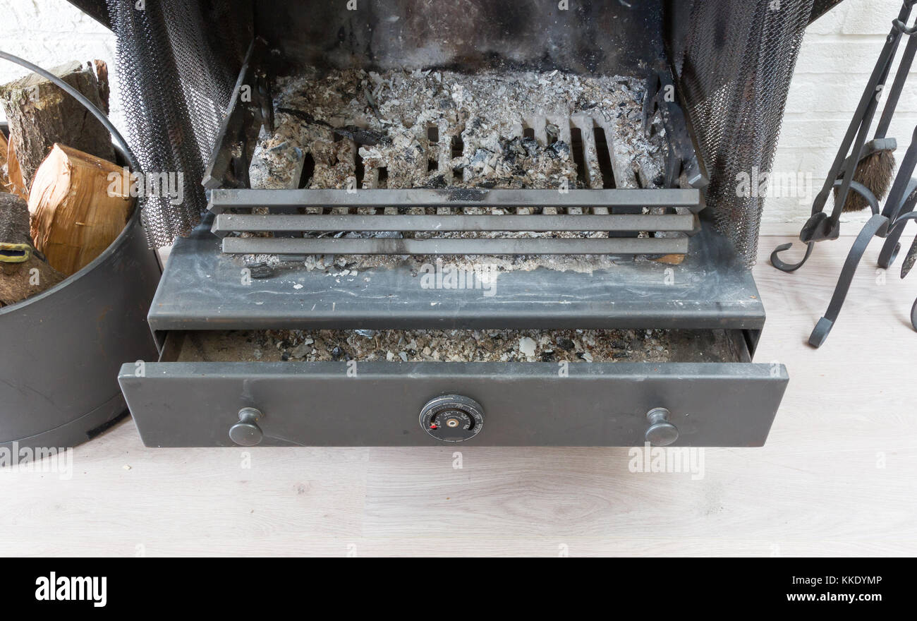 Ash in a fireplace Remnants of a cosey night at the fireplace Stock