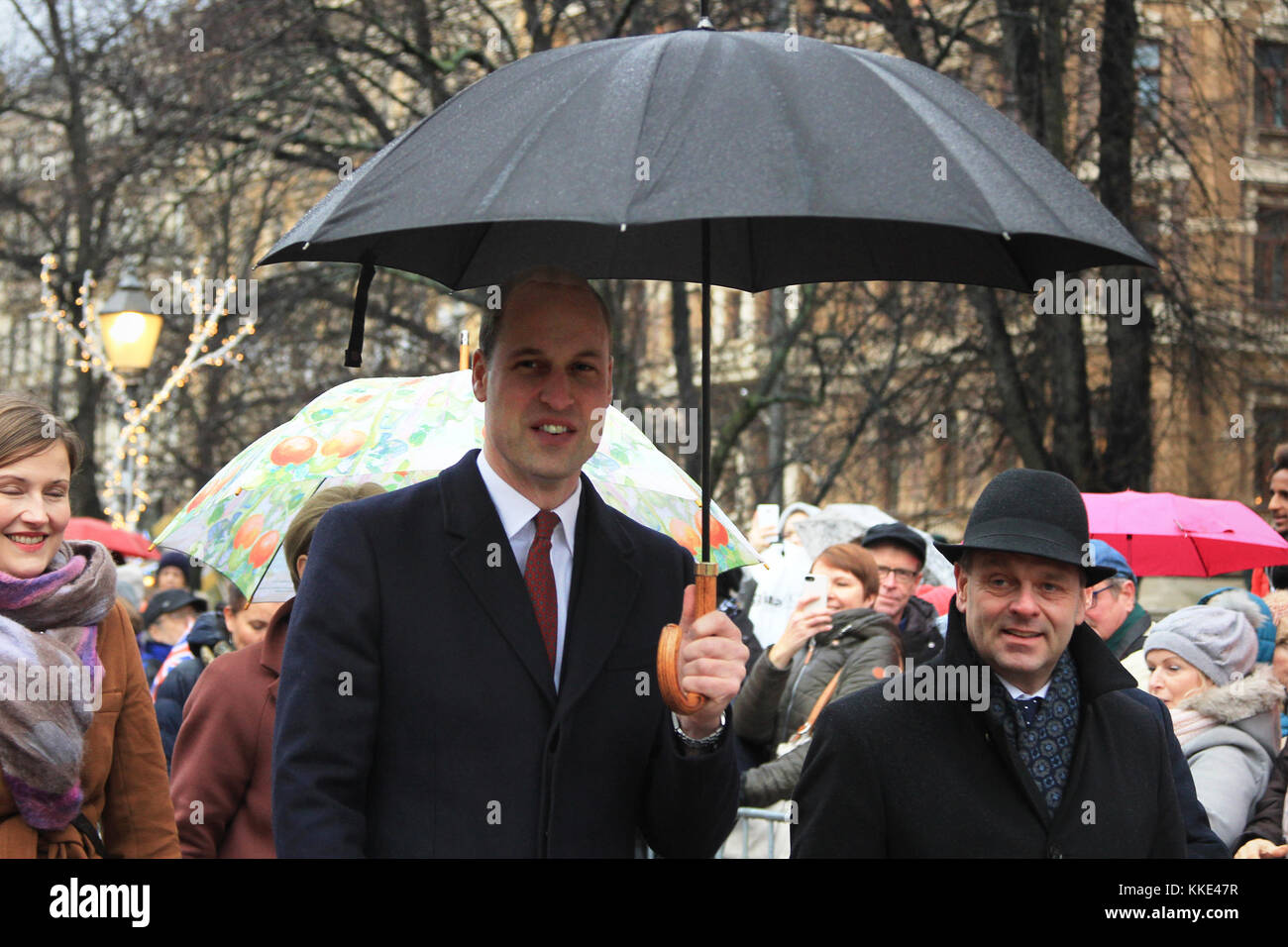 HELSINKI, FINLAND - DECEMBER 30, 2017: Prince William, accompanied with Mayor of Helsinki Jan Vapaavuori, greets people in Esplanadi Park during his v Stock Photo
