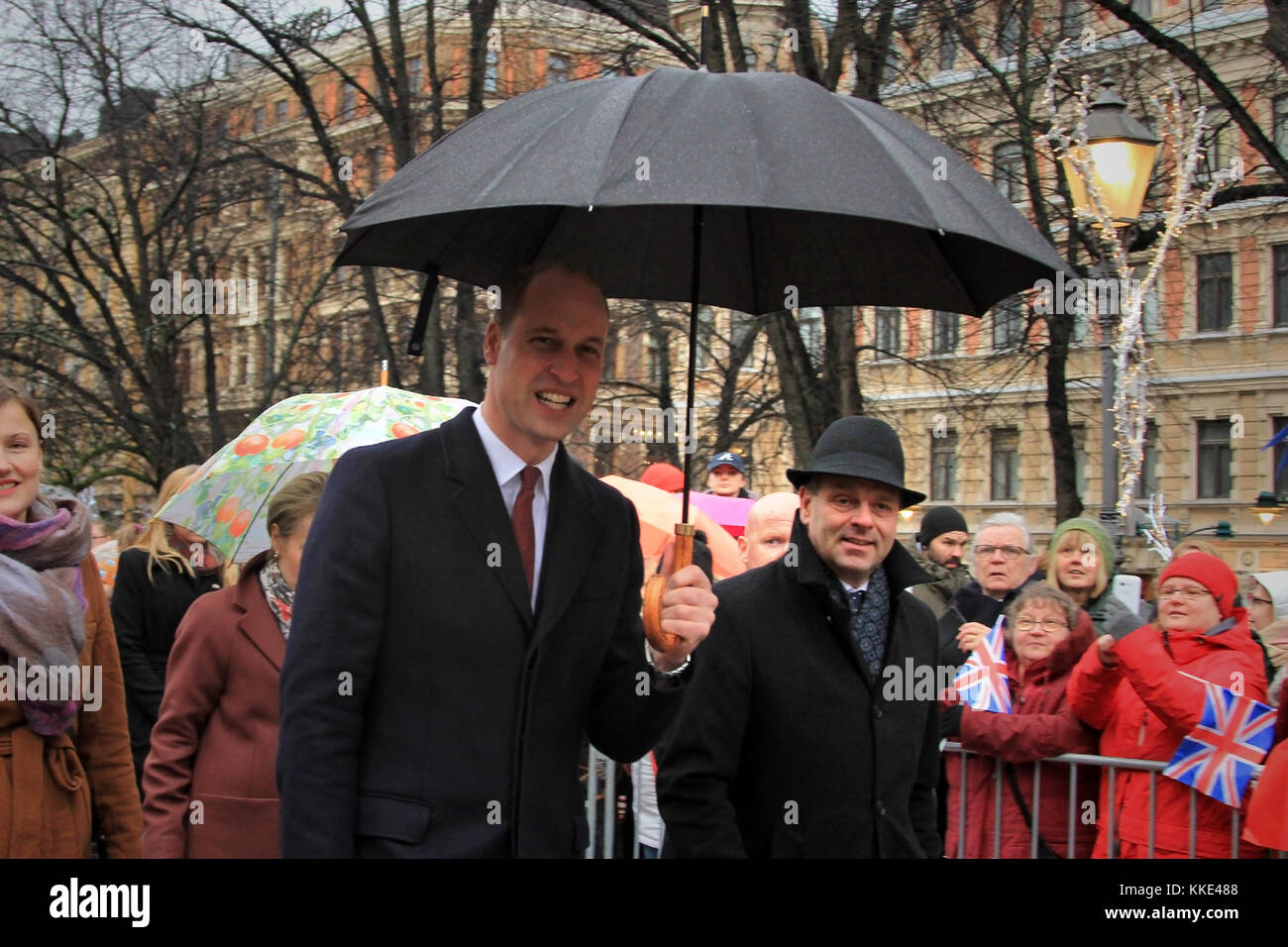 HELSINKI, FINLAND - DECEMBER 30, 2017: Prince William, accompanied with Mayor of Helsinki Jan Vapaavuori, greets people in Esplanadi Park during his v Stock Photo