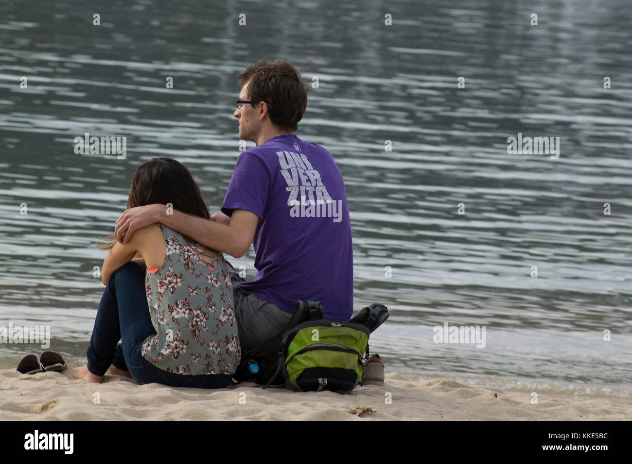 Couple in love cuddling on the beach Stock Photo