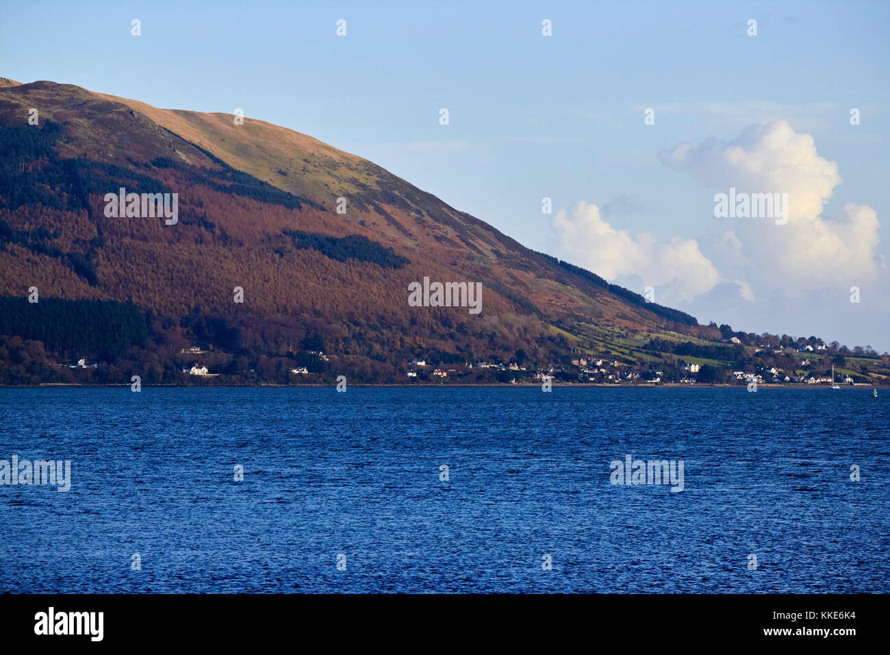 carlingford lough the mourne mountains and the small village of killowen northern ireland as seen from the republic Stock Photo