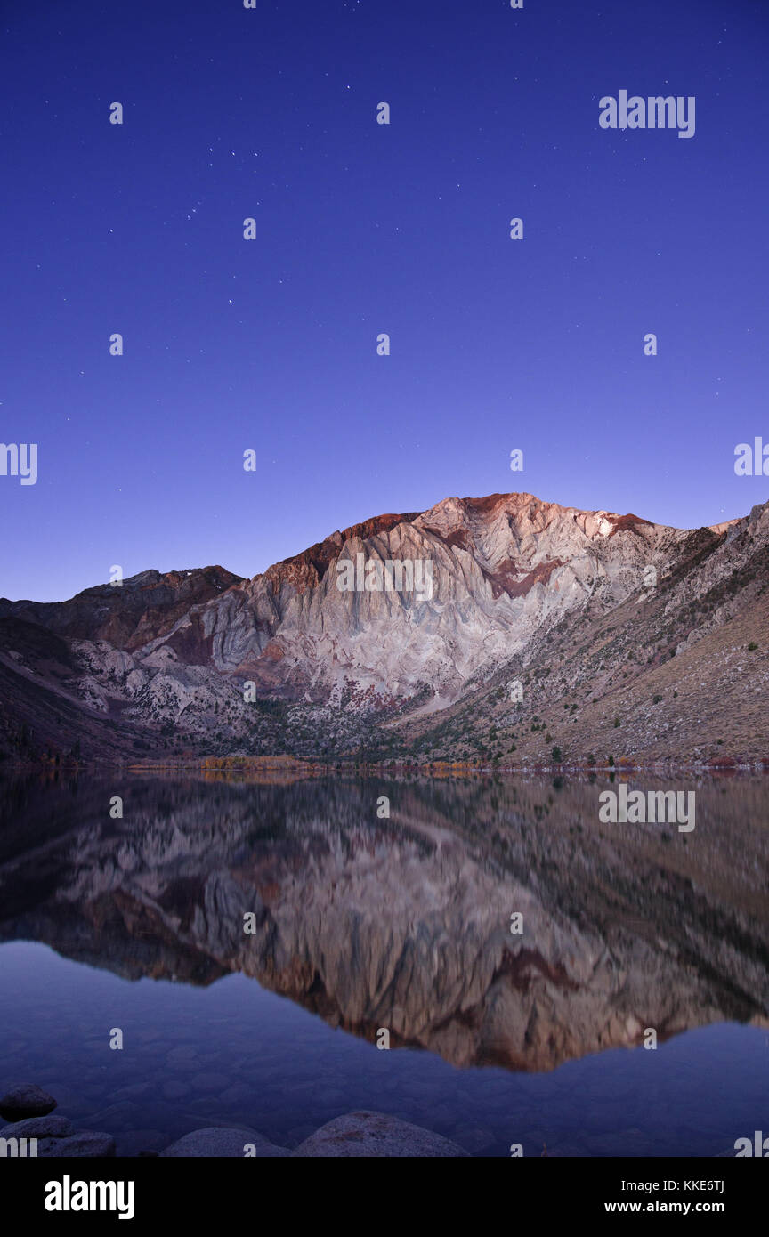 Convict Lake and Laurel Mountain early in the morning with Orion still visible in the sky Stock Photo
