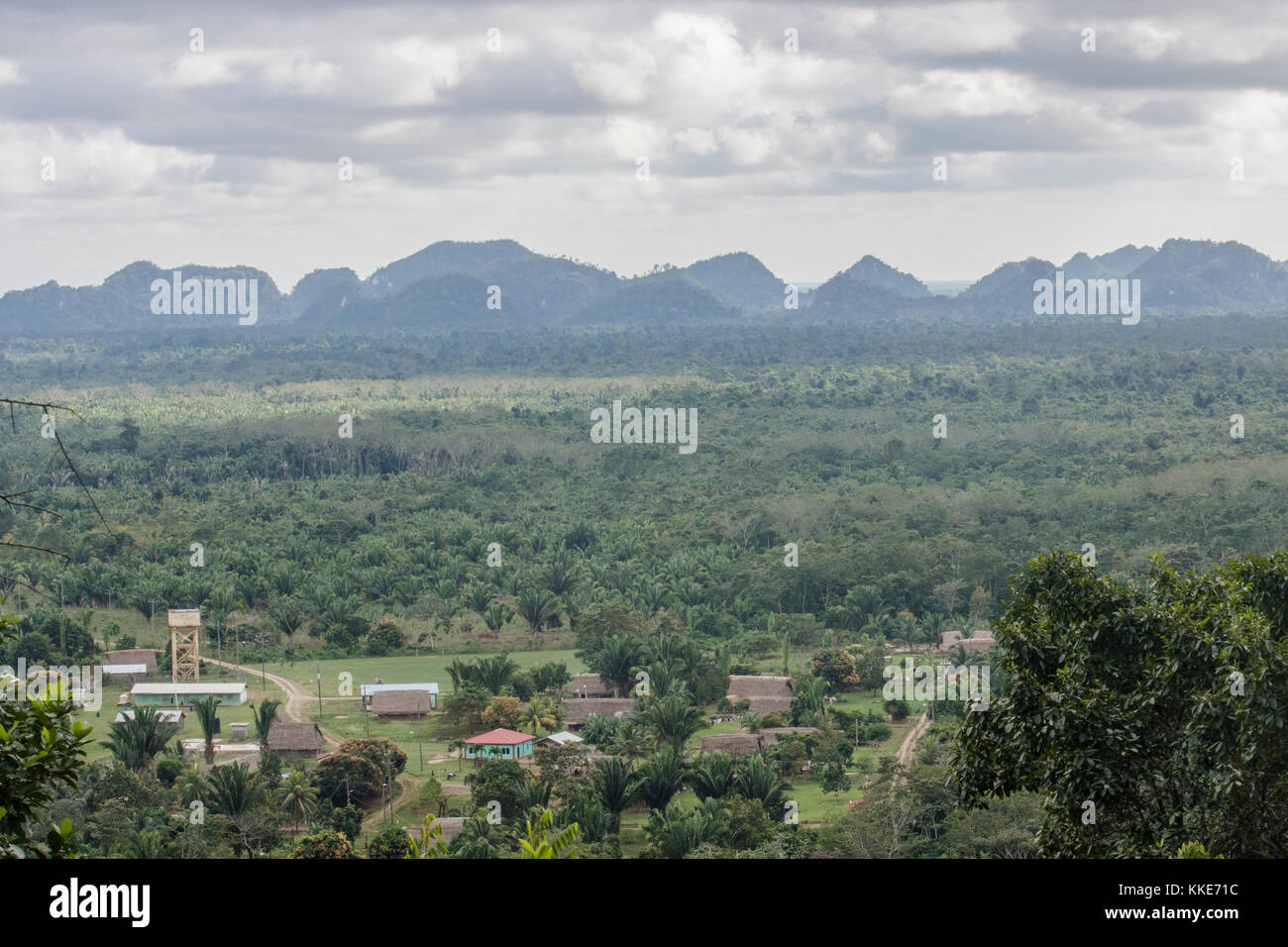 A mostly empty landscape with a tiny village in a remote part of Belize. Stock Photo