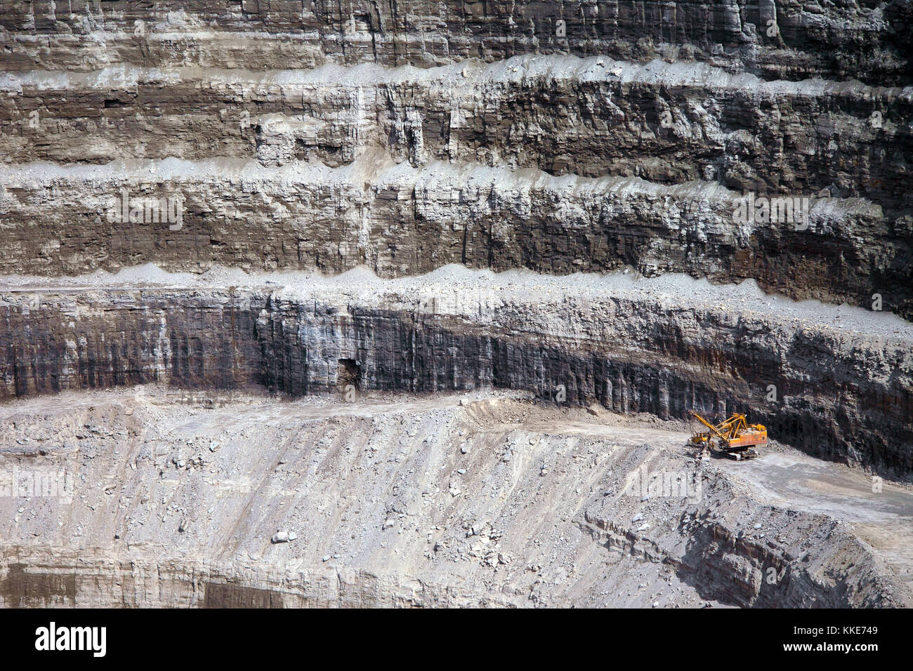 Excavator in diamond open mine - industrial process Stock Photo