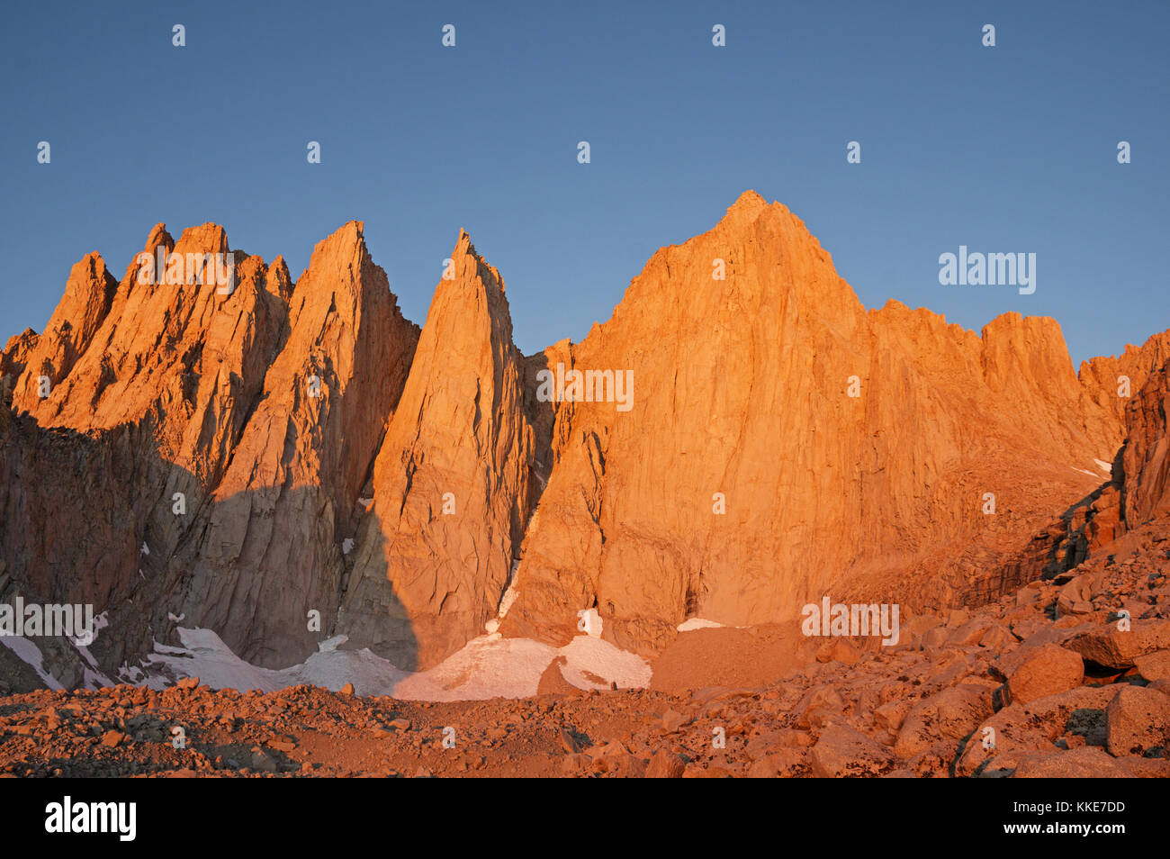 Mount Whitney and Keeler Needle lit up by the first light of dawn Stock Photo