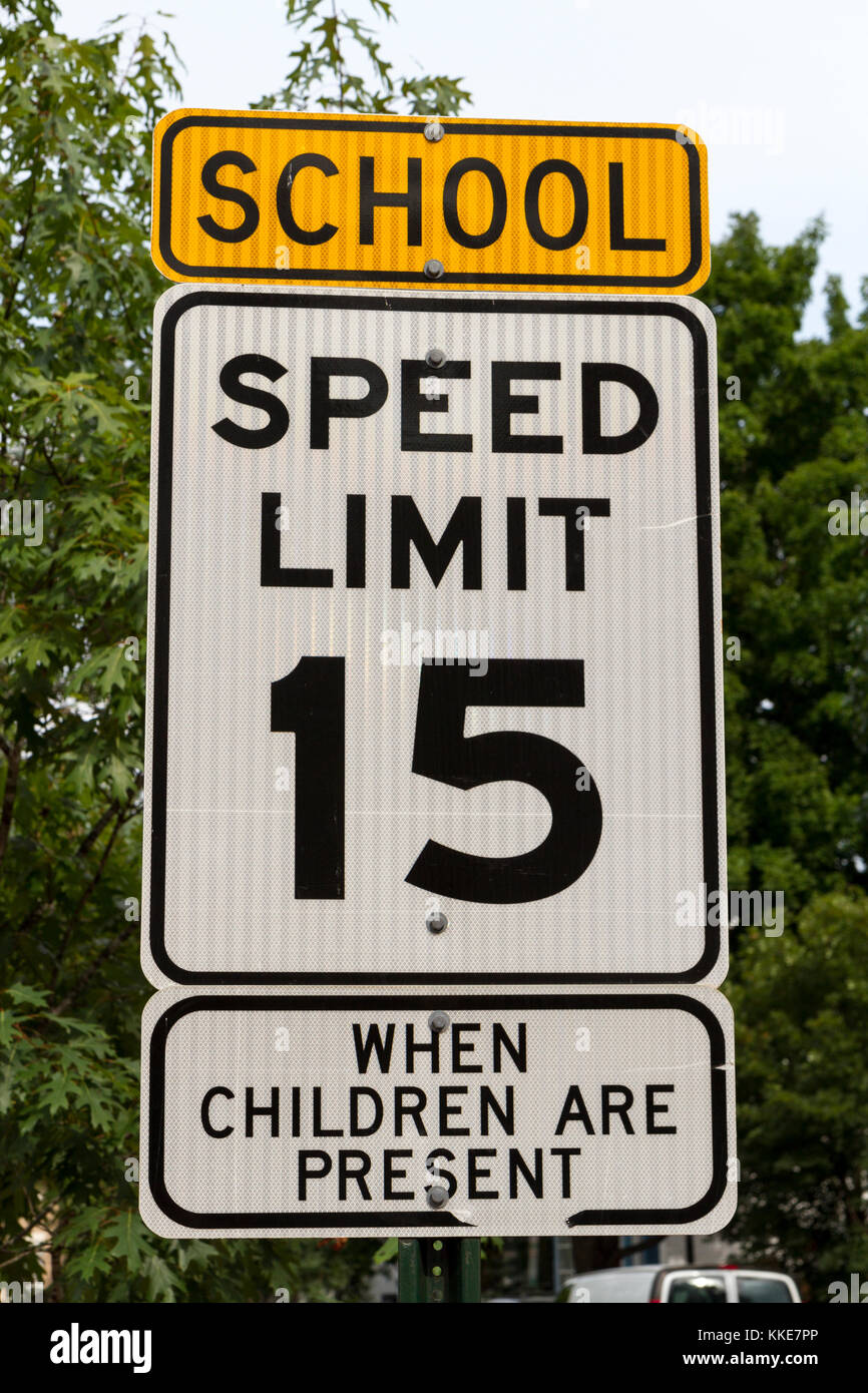 A generic 15 MPH speed limit road sign close to a school in Georgetown, Washington DC, United States. Stock Photo