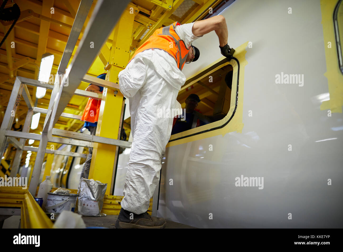 Alstom Class 390 Pendolino railway stock being refurbished at the start of the art Alstom Widnes repainting plant, window seals being replaced after p Stock Photo