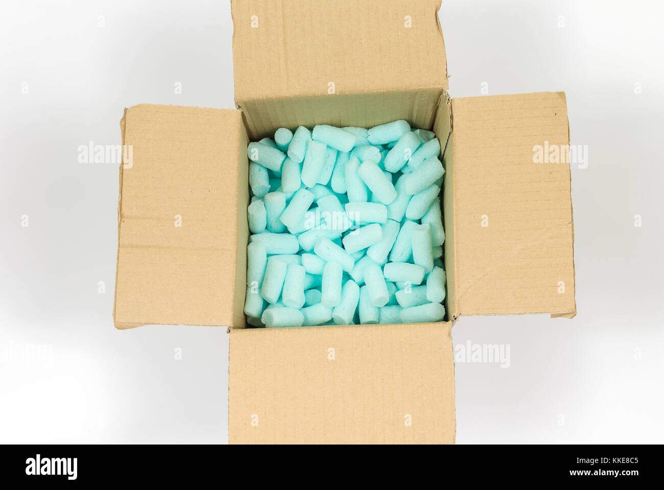 Box filled with blue styrofoam pellets Stock Photo Alamy