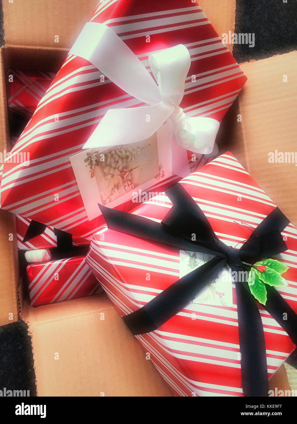 Wrapped Christmas Presents in Packing Box, USA Stock Photo
