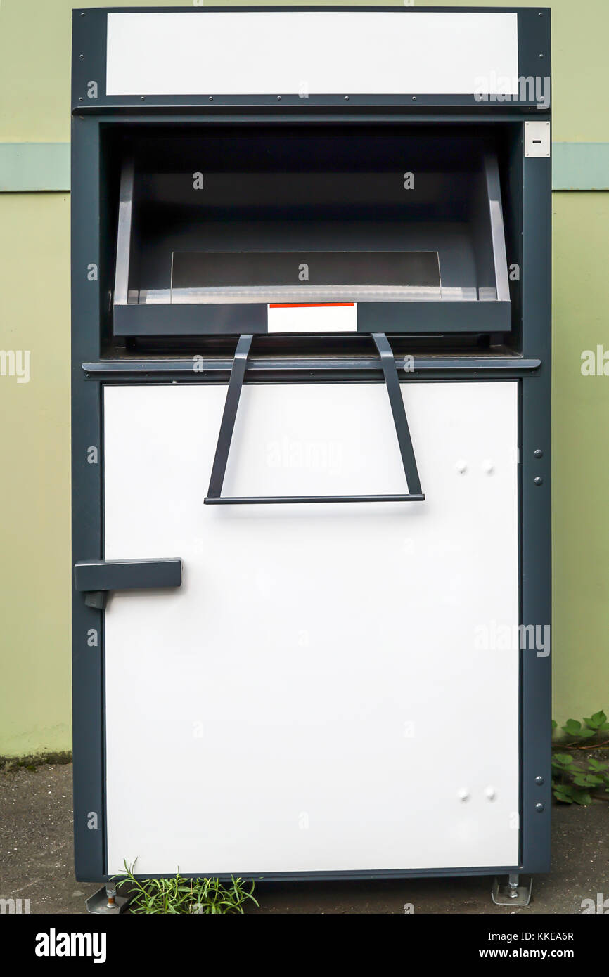 Container used for donate old clothes Stock Photo Alamy