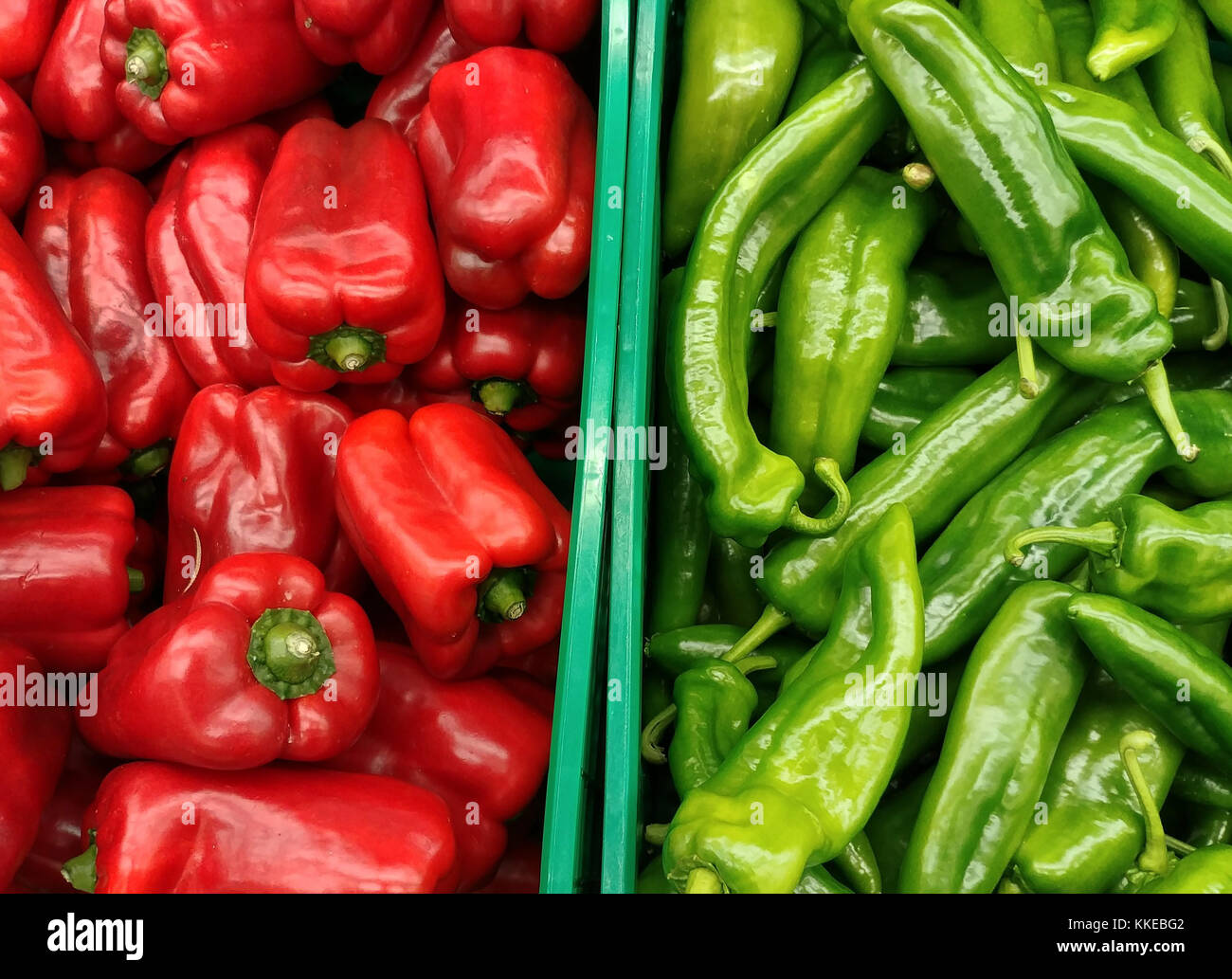 Green and red peppers in a market Stock Photo - Alamy