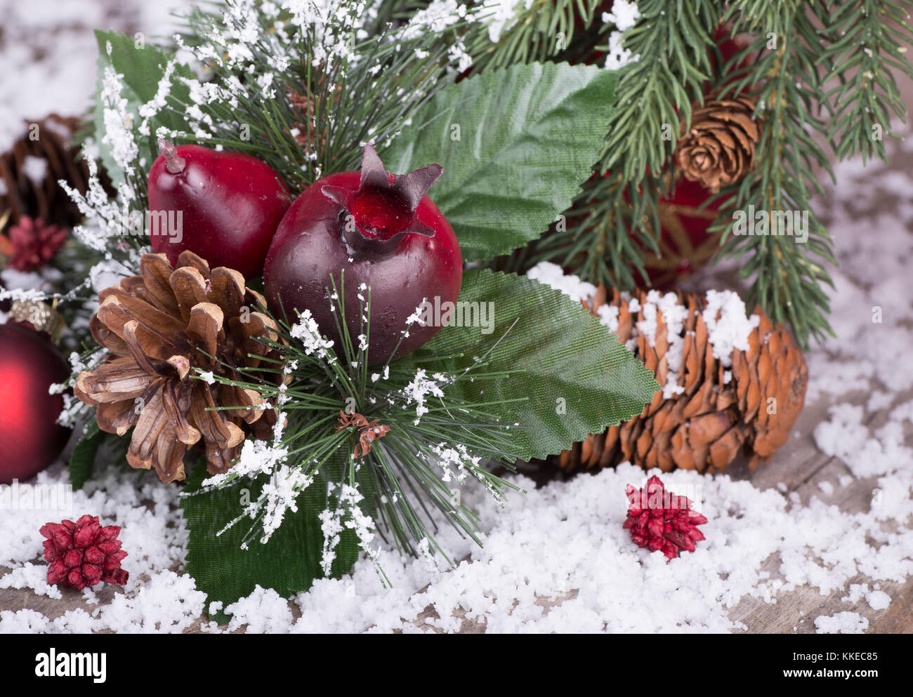Holiday Christmas decoration on wood floor with snow Stock Photo