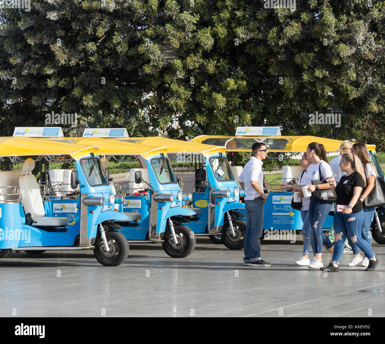 Electric, eco friendly Tuk Tuks offering city tours in Parque Santa Catalina, Las Palmas, Gran Canaria, Canary Islands, Spain Stock Photo