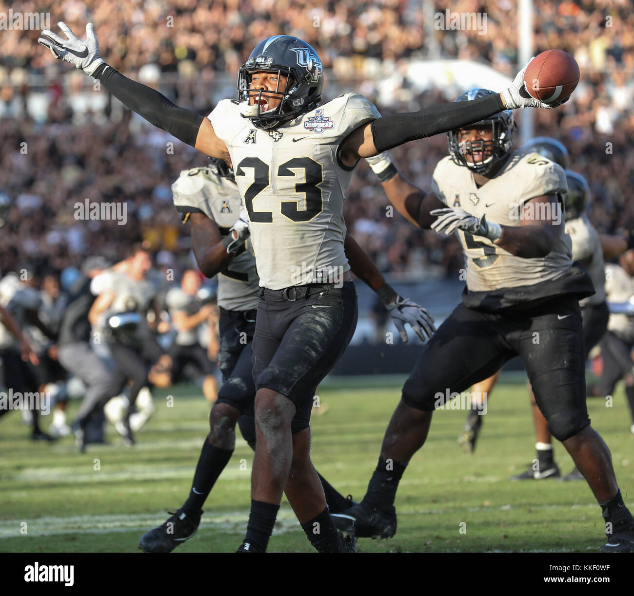 Orlando, FL, USA. 2nd Dec, 2017. UCF's Tre Neal #23 celebrates after making during the game ending interception to win the AAC Championship football game between the UCF Knights and the Memphis Tigers at the Spectrum Stadium in Orlando, FL. Kyle Okita/CSM/Alamy Live News Stock Photo