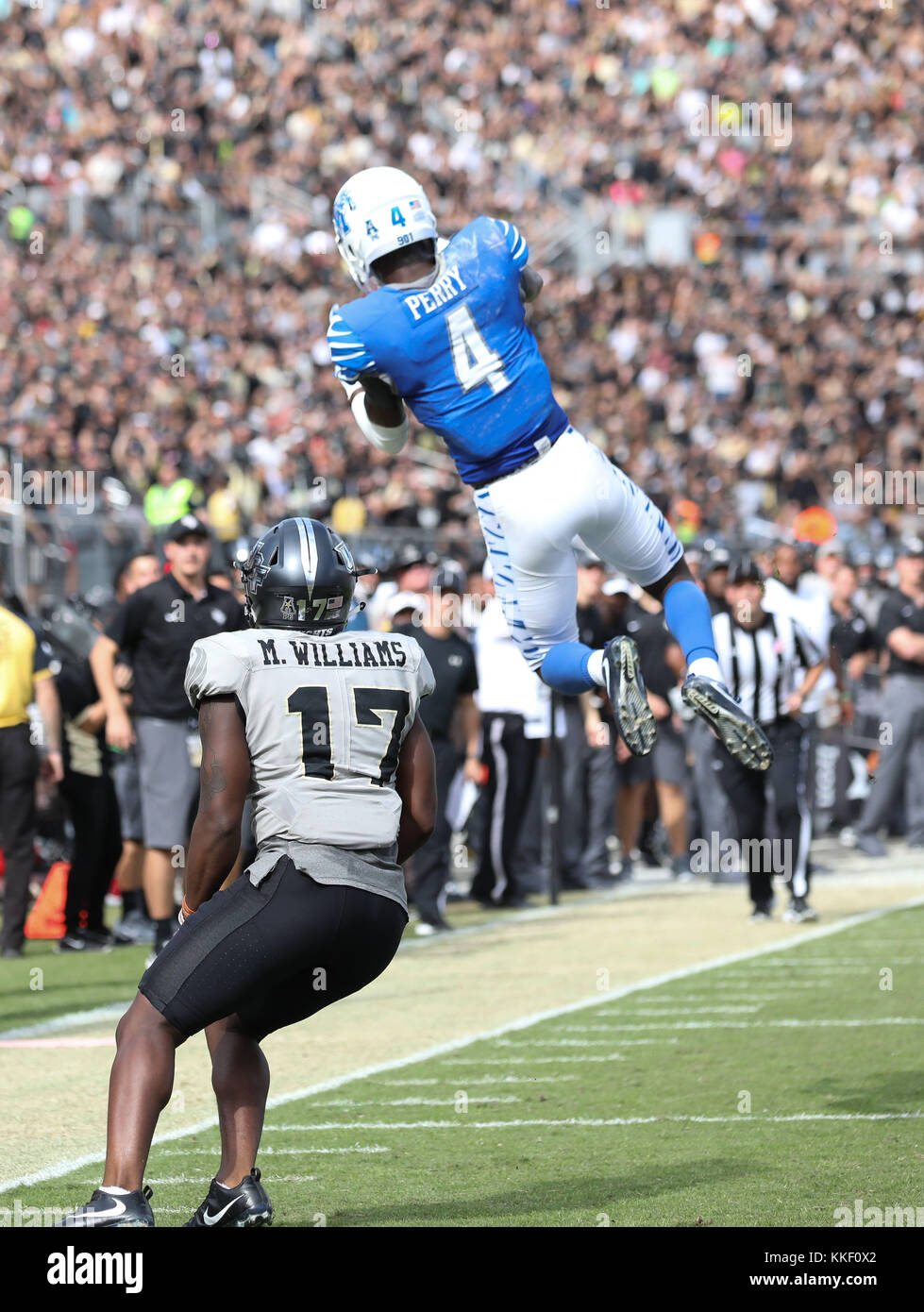 Orlando, FL, USA. 2nd Dec, 2017. Memphis' Josh Perry #4 jumps high in the air to try and intercept a pass but landed out of bounds during the AAC Championship football game between the UCF Knights and the Memphis Tigers at the Spectrum Stadium in Orlando, FL. Kyle Okita/CSM/Alamy Live News Stock Photo