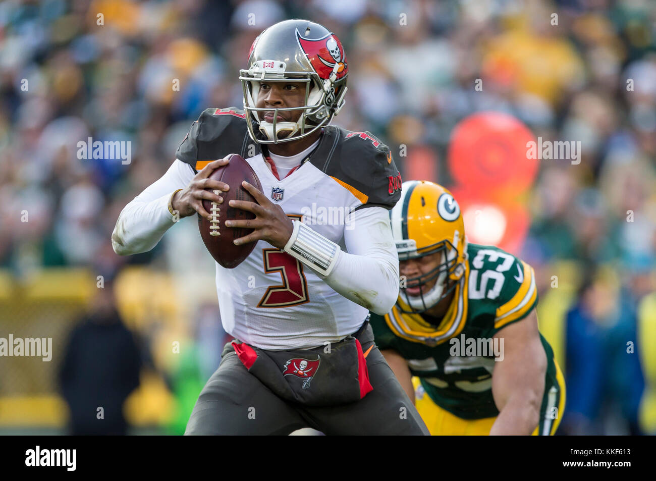 December 3, 2017: Tampa Bay Buccaneers quarterback Jameis Winston #3 scrambles during the NFL Football game between the Tampa Bay Buccaneers and the Green Bay Packers at Lambeau Field in Green Bay, WI. Packers defeated the Buccaneers in overtime 26-20. John Fisher/CSM Stock Photo