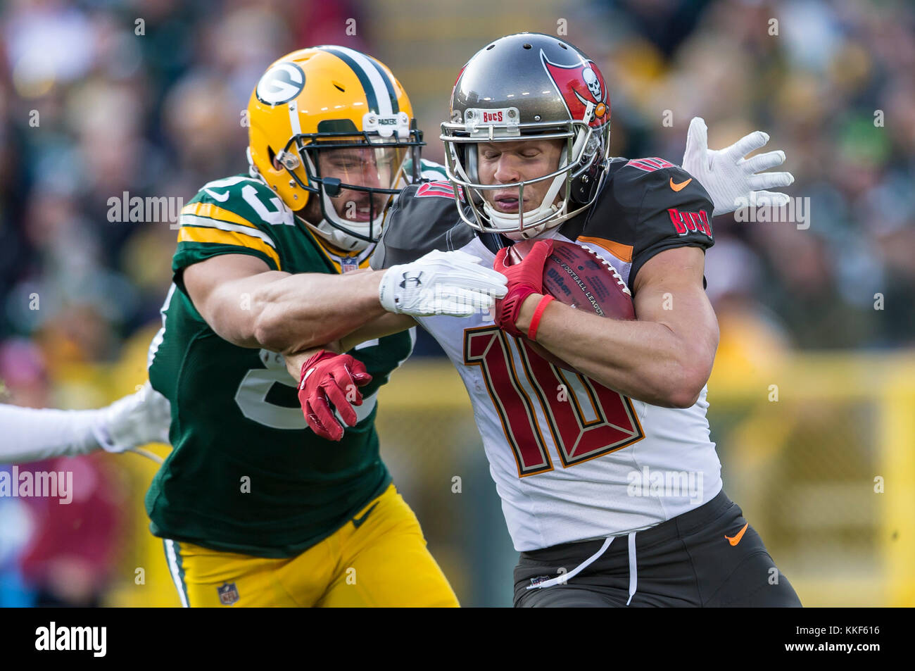 December 3, 2017: Green Bay Packers Jeff Janis #83 tackles Tampa Bay Buccaneers punt returner Adam Humphries #10 during the NFL Football game between the Tampa Bay Buccaneers and the Green Bay Packers at Lambeau Field in Green Bay, WI. Packers defeated the Buccaneers in overtime 26-20. John Fisher/CSM Stock Photo