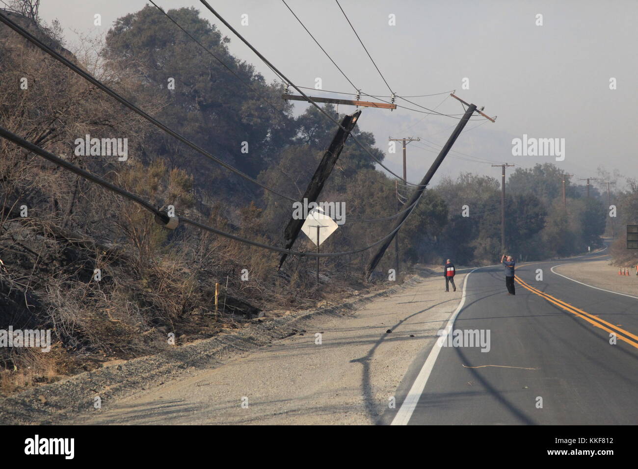 California, USA. 5th Dec, 2017. Damaged poles are seen in Ventura County of California, the United States, Dec. 5, 2017. Brush fires across the region were fed by extremely high winds, low humidities and dry fuel. Hundreds of fire fighters have been working very hard to minimize damage to property and evacuations are taking place in many places in south California, said authorities. Credit: Huang Heng/Xinhua/Alamy Live News Stock Photo