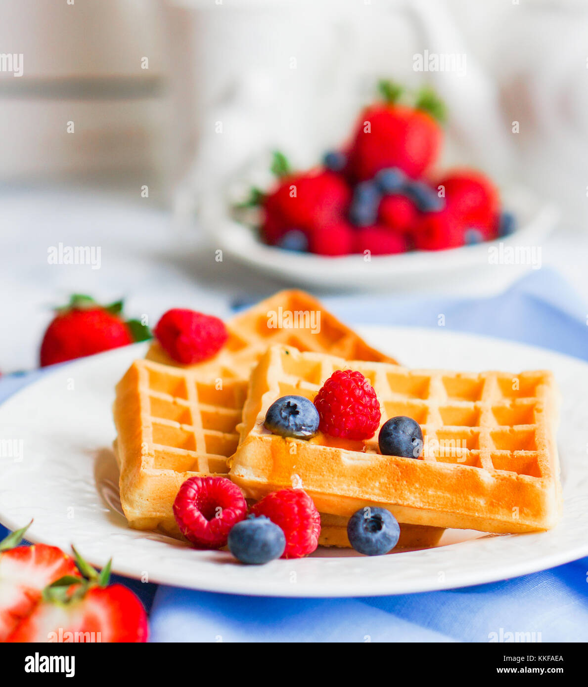 Belgian Waffles With Berries On Rustic Background Stock Photo