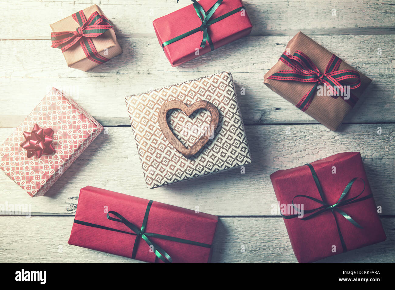 packed gifts flat lay on white wooden background Stock Photo